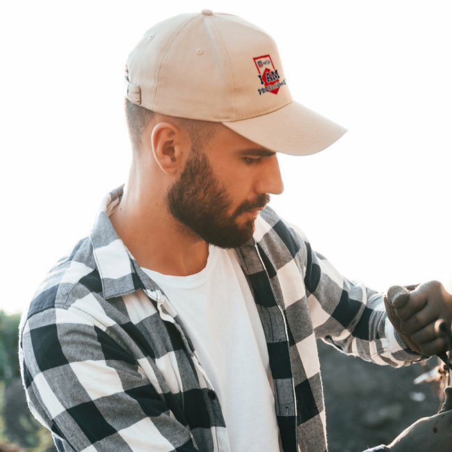 guy wearing white hat with nrca logo